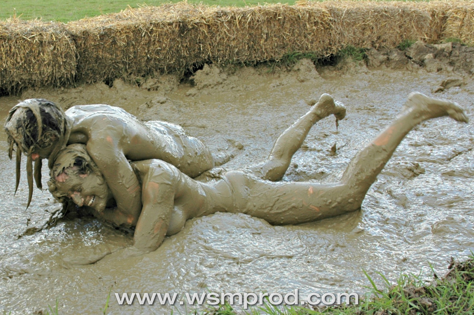 Women nude mud wrestling